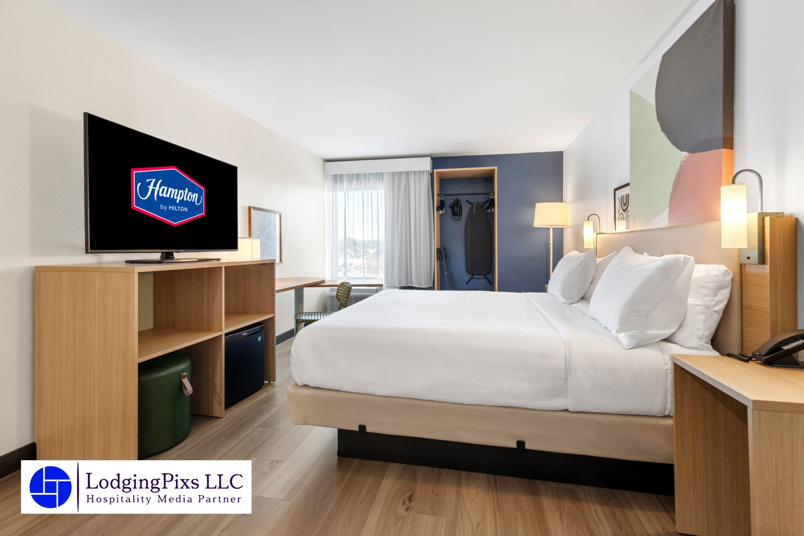 Professional hospitality photographer capturing luxury bedroom interior